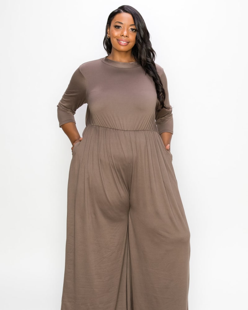 Front of a model wearing a plus size Sienna Jumpsuit in Mocha by L I V D. | dia_product_style_image_id:240998